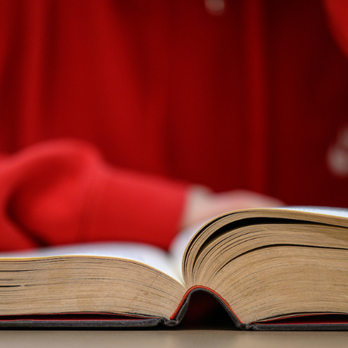 An open book showing the spine and pages.